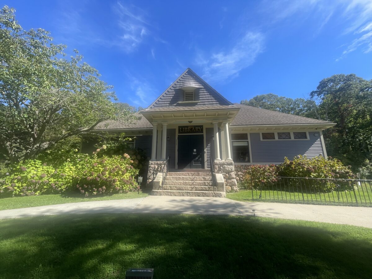 exterior shot of West Falmouth Library under a clear blue sky