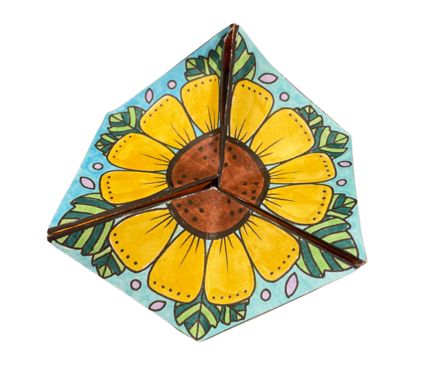 picture of a kaleidocycle with a sunflower design