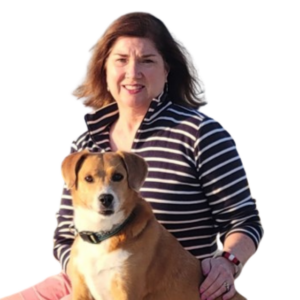 photo of Cape Cod author Janis Robinson Daly and her dog