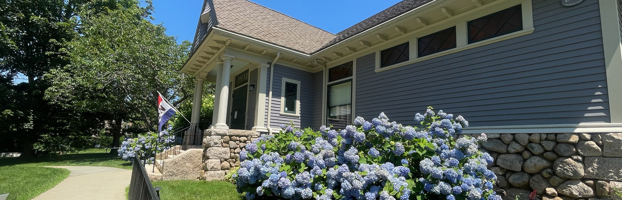 exterior daytime photo of west falmouth library